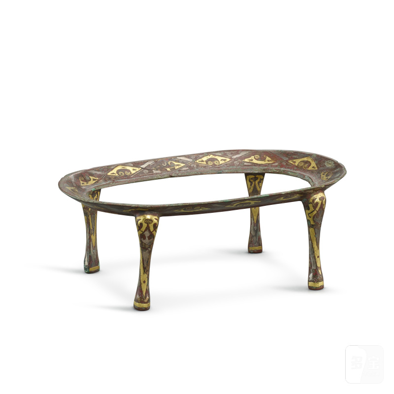An archaic gold and silver-inlaid bronze 'geometric' cup stand, Western Han dynasty | 西漢 銅錯金銀幾何紋羽觴杯四足架